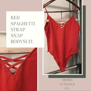 Red spaghetti strap snap bodysuit. Size XL no tags